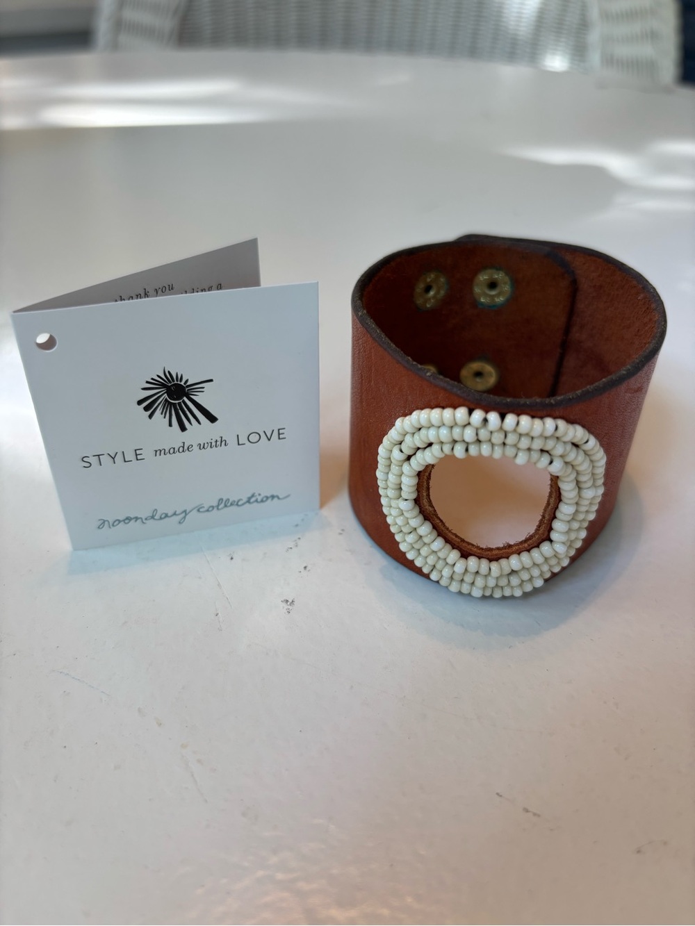 Noonday Collection Brown Leather Cuff with Cream Beaded Ring